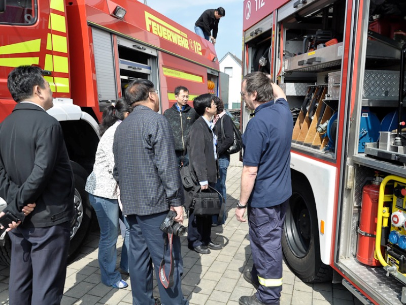 Interessierte chinesische Zuhörer